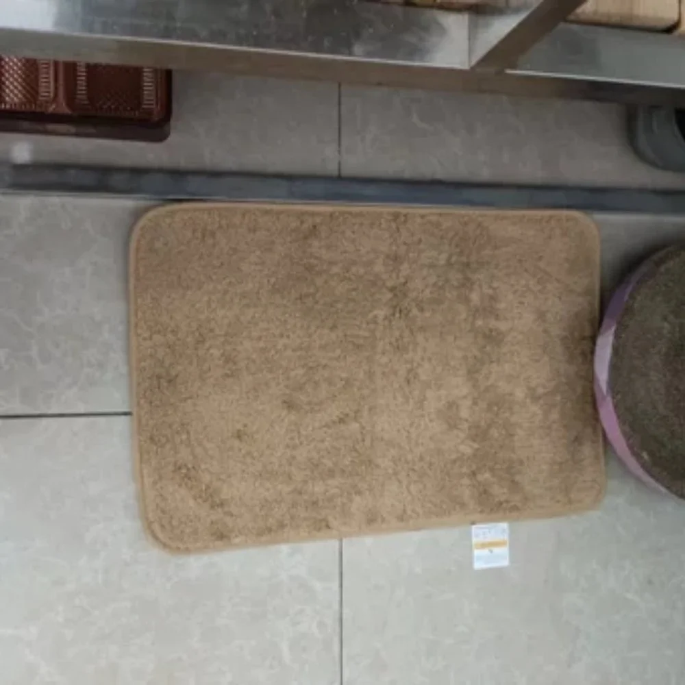 Bathroom and kitchen floor with blankets